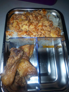 A picture of Rice and egg source with chicken.