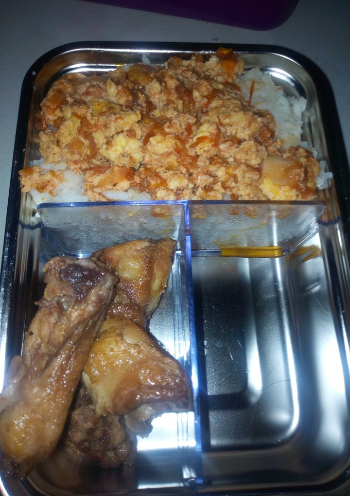 A picture of Rice and egg source with chicken.