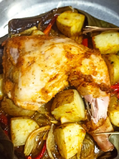 Una foto de Pollo y papas al horno