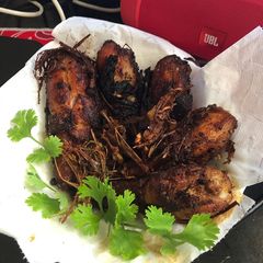 A picture of Fried chicken with lemon grass crisps by Marion’s kitchen.