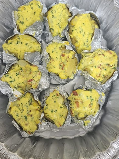 Una foto de Papas al horno con tocino