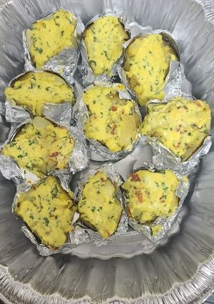 Una foto de Papas al horno con tocino