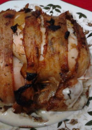 Una foto de Pollo envuelto con verduras al horno