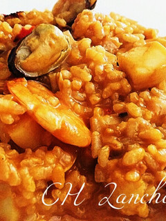 Una foto de Arroz meloso marinero