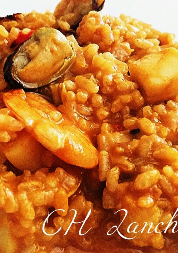 Una foto de Arroz meloso marinero