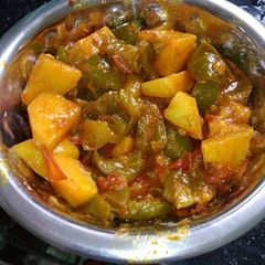 A picture of Aloo with capsicum.