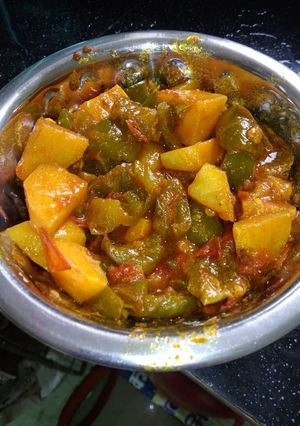 A picture of Aloo with capsicum.