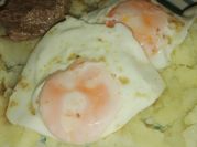 Una foto de bistec con pure