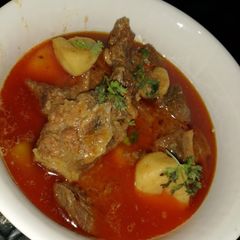 A picture of Aalu gosht ka salan.