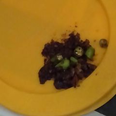 A picture of Green Mirchi ka achar/pickle.