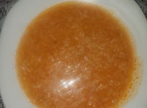 Una foto de Arroz caldoso al ajo de mi pá