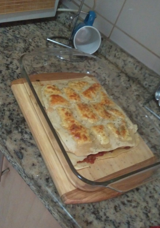 Una foto de Lasagna con salsa de tomates, carne y queso Philadelphia