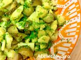 Potato salad with pickled cucumbers and green peas