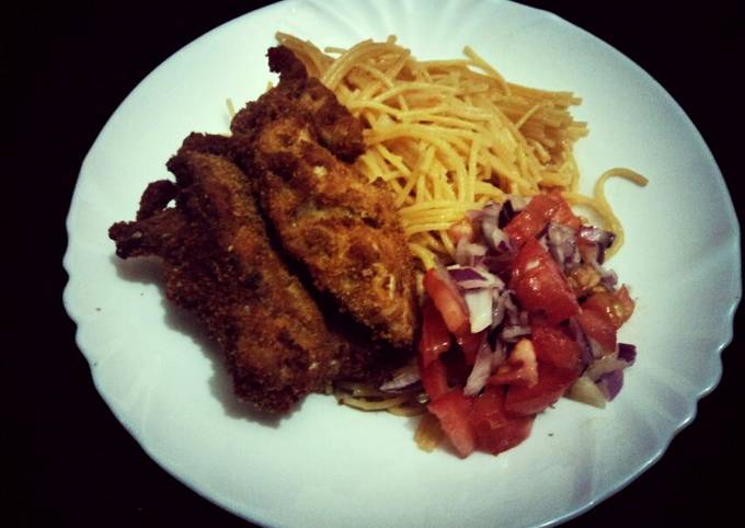 Pan fried chi with noodles and kachumbari