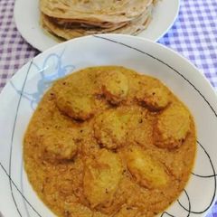 A picture of Dum aloo (baked potatoes).