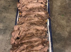 Una foto de Bife de chorizo al horno con champagne
