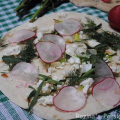 A picture of Traditional Herb salad with bread and cheese OR Sabzi Khordan.