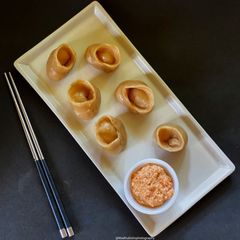 A picture of Chicken Momo & Momo Sauce.