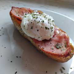 Poached Egg & Bacon on a Soft Roll A picture of Poached Egg & Bacon on a Soft Roll.