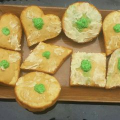 A picture of Lemon cake with rough butter iced.