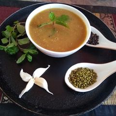 A picture of Tomato drumstick soup.