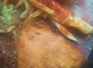 Una foto de Pechuga de pollo empanizada