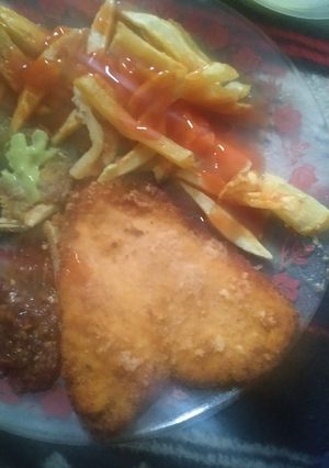 Una foto de Pechuga de pollo empanizada