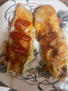 صورة لوصفة النقانق المغلفة بالبطاطا والجبنة 🧀🌭