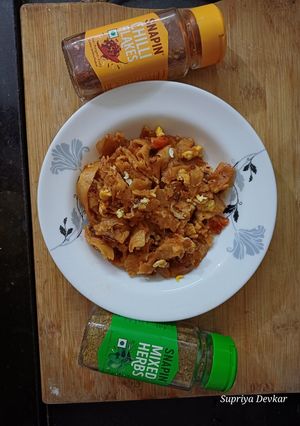 A picture of Cheesey leftover chapati pasta.