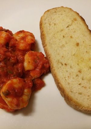 A picture of Spicy prawns with garlic bruschetta.