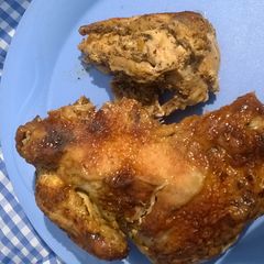 A picture of Griiled chicken with herbs.