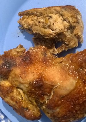 A picture of Griiled chicken with herbs.