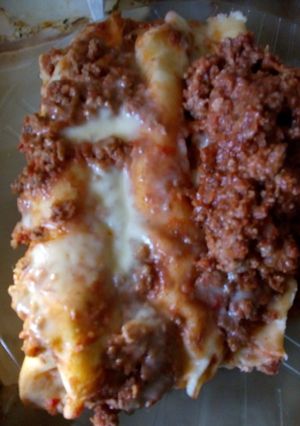 Una foto de Canelones de espinaca y ricota