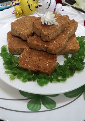A picture of Elaichi flavor wheat flour biscuits with sesame seeds.