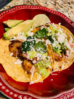 A picture of T’s Shrimp Tacos.