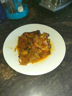 Una foto de Costillas asadas con vino blanco