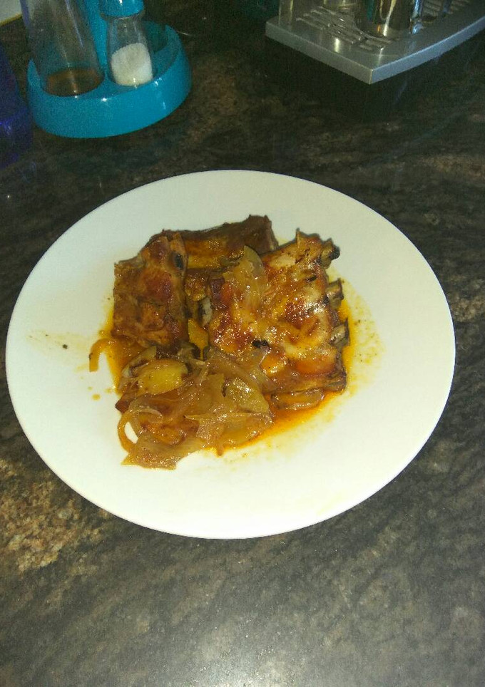 Una foto de Costillas asadas con vino blanco