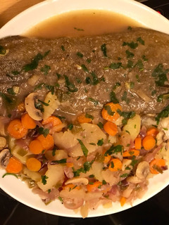 Una foto de Lenguados con verdura al horno