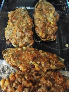 Una foto de Berenjenas asadas rellenas