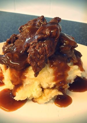 A picture of Creamy Mashed Potato with 5 hour Slow Cooked Beef & Gravy.