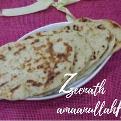 A picture of Tawa Garlic Naans.