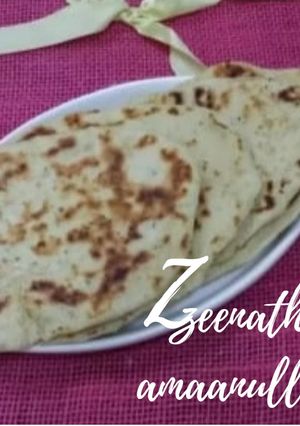 A picture of Tawa Garlic Naans.