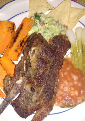 Una foto de Costillas de res con zanahorias y cebollas al mezcal