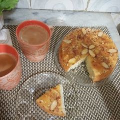 A picture of Almond honey cake with tea.