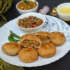 A picture of Litti Chokha Bihari Style/ Authentic and Soulful Rustic Dish Litti Chokha for Monsoon ✨️.