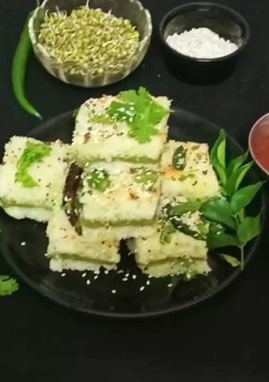 A picture of Suji Sprouts Sandwich Dhokla.