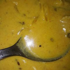 A picture of Punjabi style kadhi pakoda.