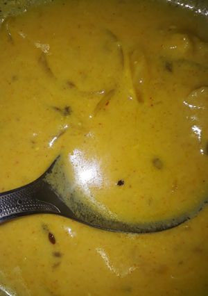 A picture of Punjabi style kadhi pakoda.