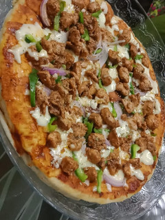 A picture of Chicken fajita spicy tawa pizza.
