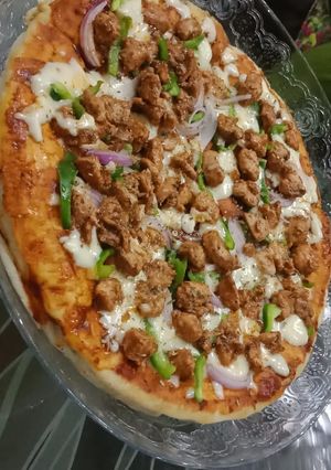 A picture of Chicken fajita spicy tawa pizza.